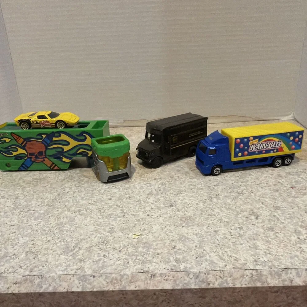 Diecast Truck Lot – RAIN-BLO Semi, UPS Truck, Crayon Rig, Ford GT – 4 pcs